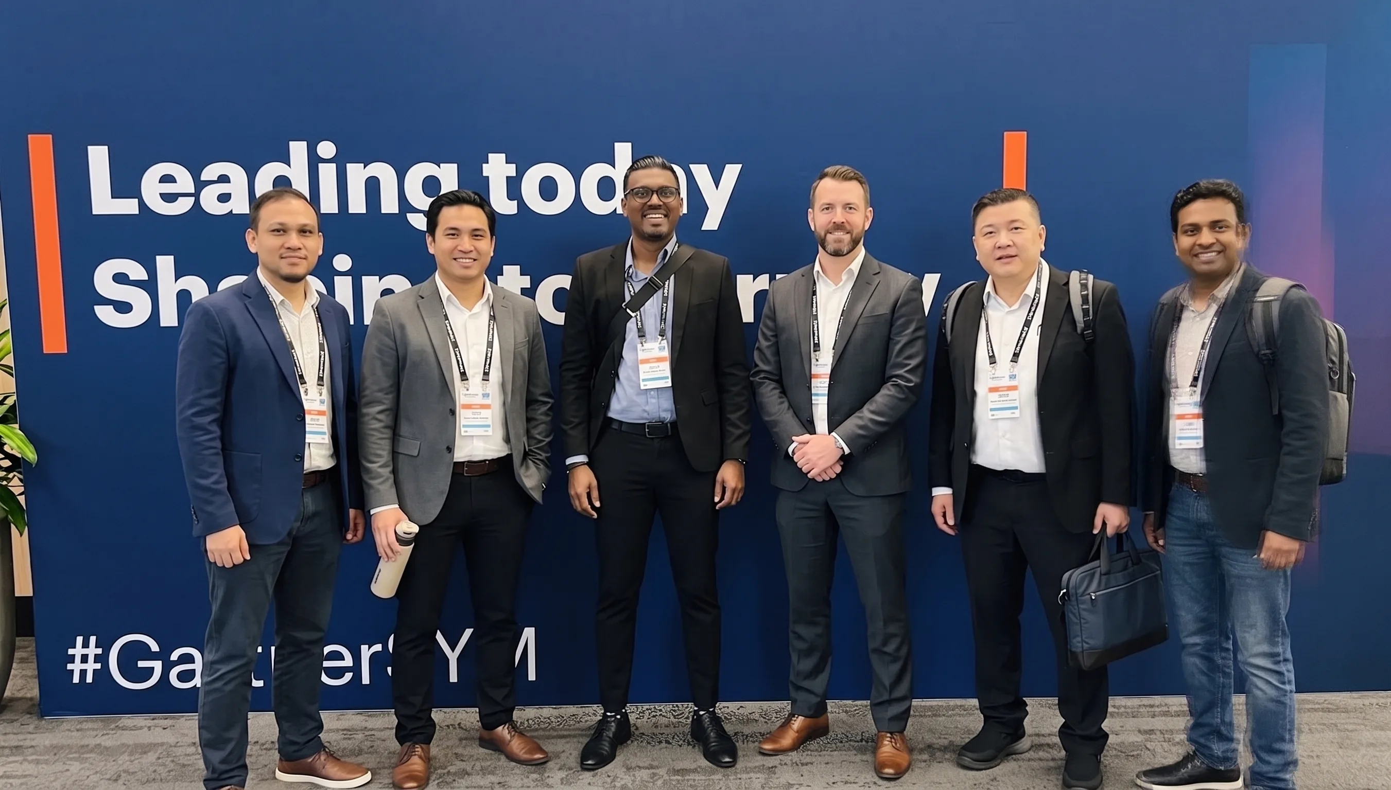 Quantum Flairs team members at a Gartner conference